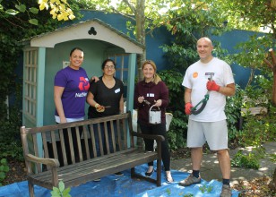 Natwest corporate volunteers gardening at Little Havens