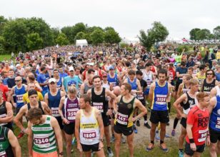 marathon runners gathering at the start line