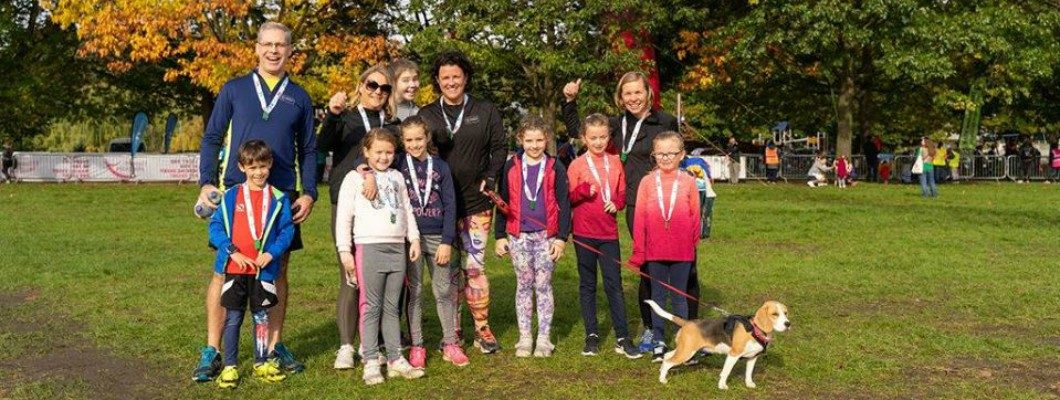 Family and their dog take part in the 3k Fun Run