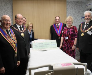 Masons presenting cheque