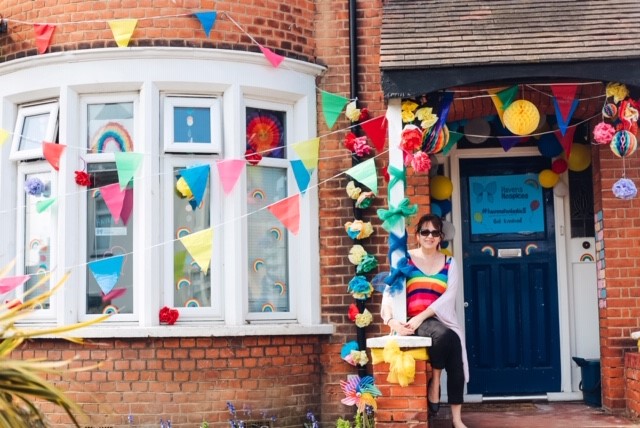 Claire outside her decorated home