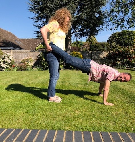 Jane and her husband Mike attempting the 'wheelbarrow' challenge