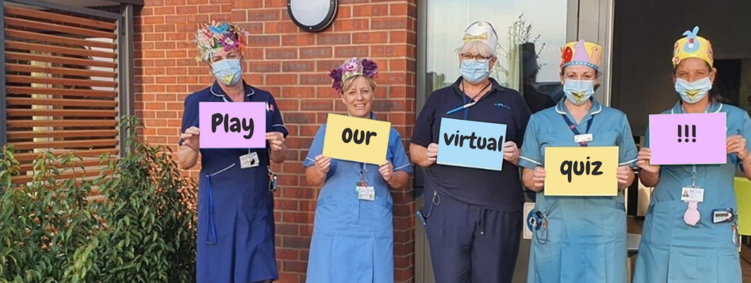 Nurses holding up cards spelling out 'Play our virtual quiz'