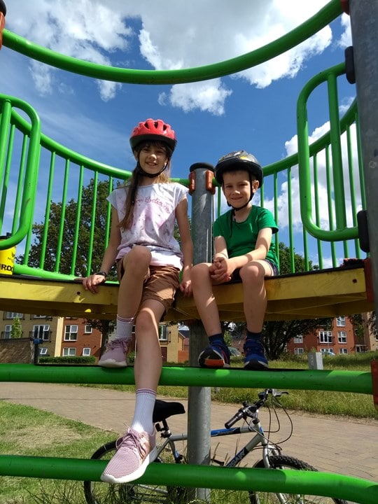 Sophie and Adam taking part in their cycling challenge