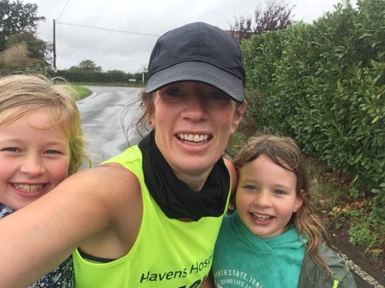 Lucy and her daughters after running her virtual London Marathon