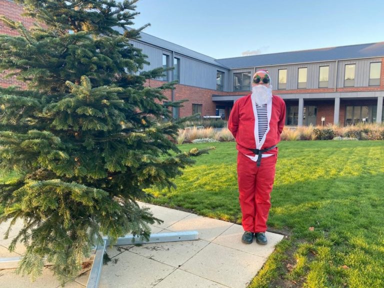 Martin Hill in festive fancy dress outside Fair Havens Hospice