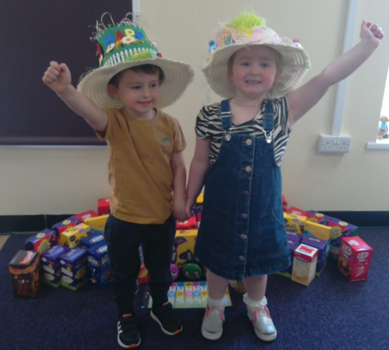 Children from Honeybear House Nursery with their Easter Bonnets and Eggs they donated
