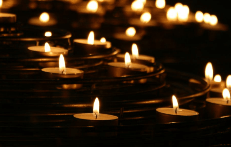 Candles lit at a service
