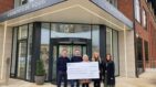 Cheque presentation outside Countryside's offices