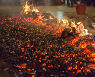 hot coals on the floor smoldering bright red