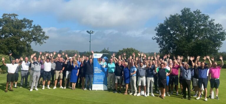 Golfers cheering after a day of golf