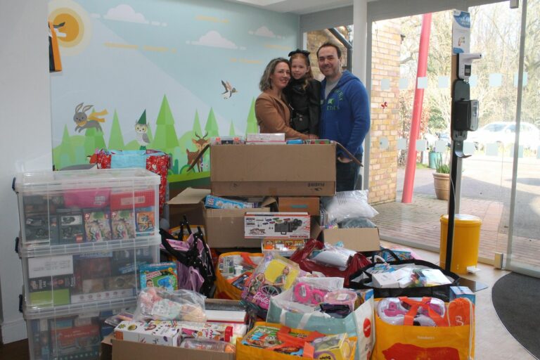 Bella's familydeliver toys in Little Havens reception