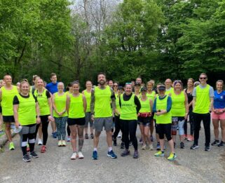 Group of people in Havens Hospices branded running vests