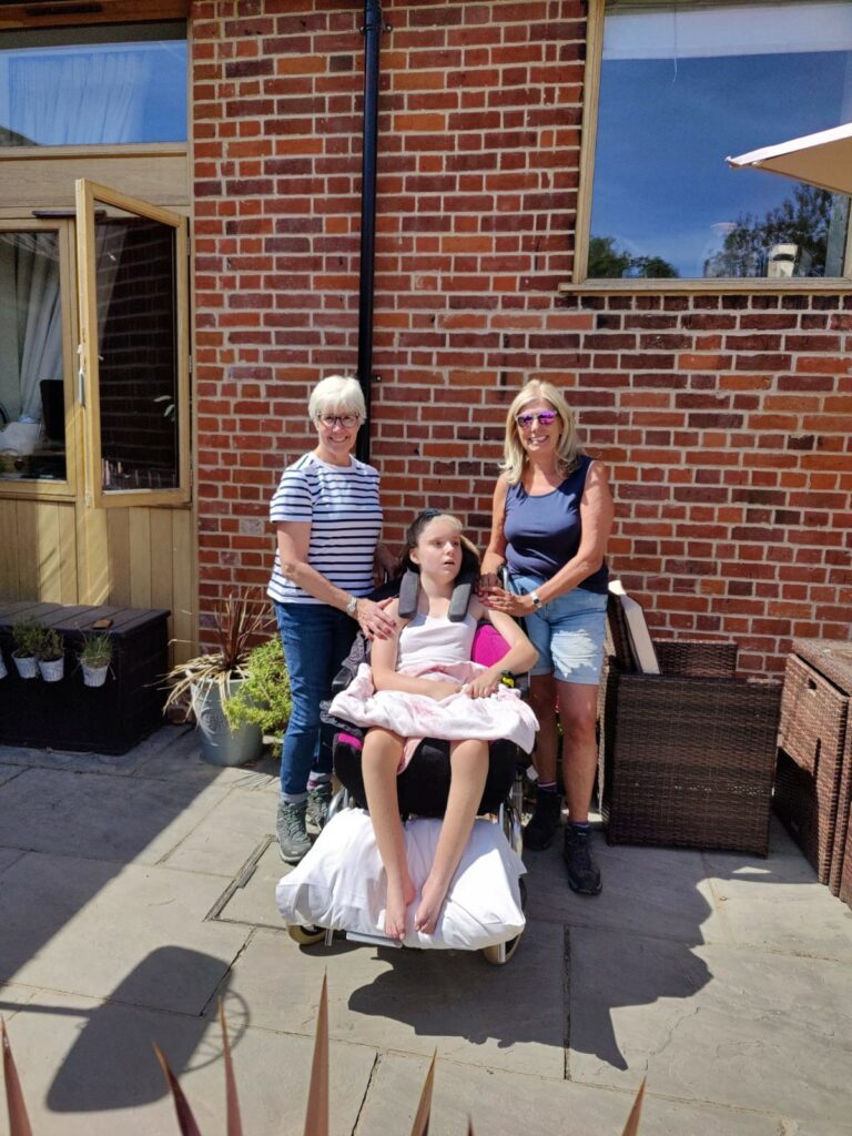 Sandra and Susie with Evie
