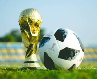 World cup trophy and football