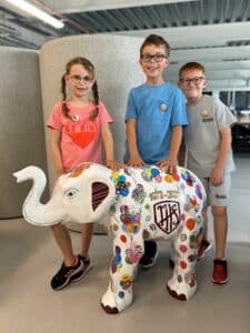 Jotman Hall School pupils with their baby elephant sculpture