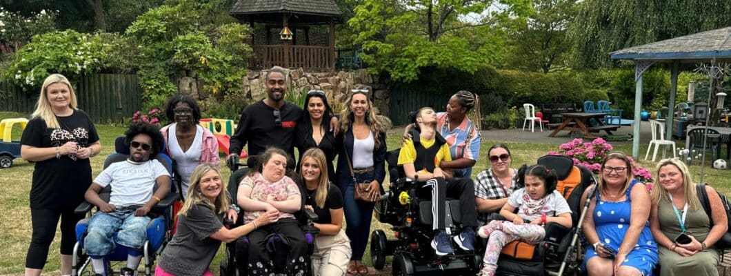 Simon and Ayshen Webbe with families in the garden of Little Havens