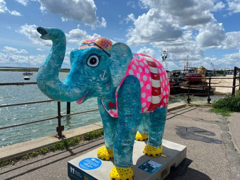 Elephant sculpture positioned in Old Leigh, with the sea in the background.