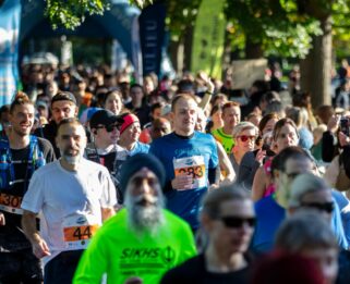 Runners in Chelmsford's Central Park after just starting the race