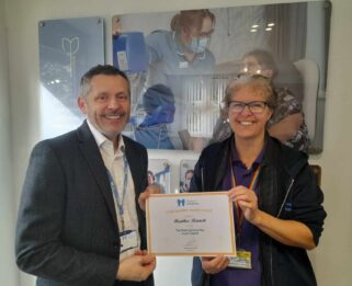 Steve Smith, CEO of Havens Hospices and Heather Bennett holding a making everyday count certificate.