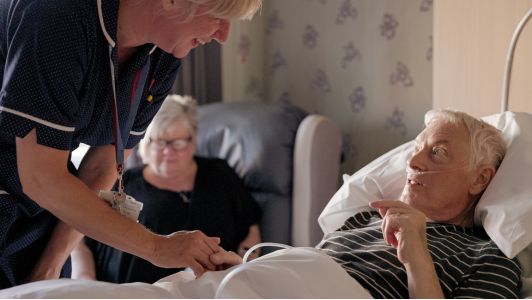 A Fair Havens Nurse smiling at a patient