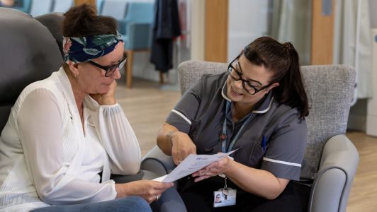 Fair Havens Care Team member talking with a patient