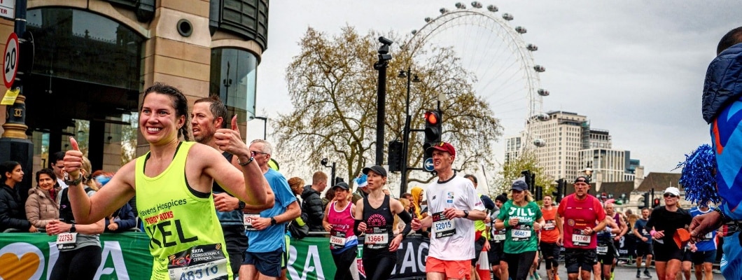 London marathon runners, with the London Eye in the background