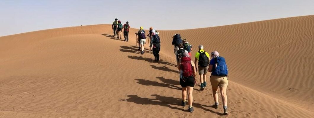 People trekking the Sahara