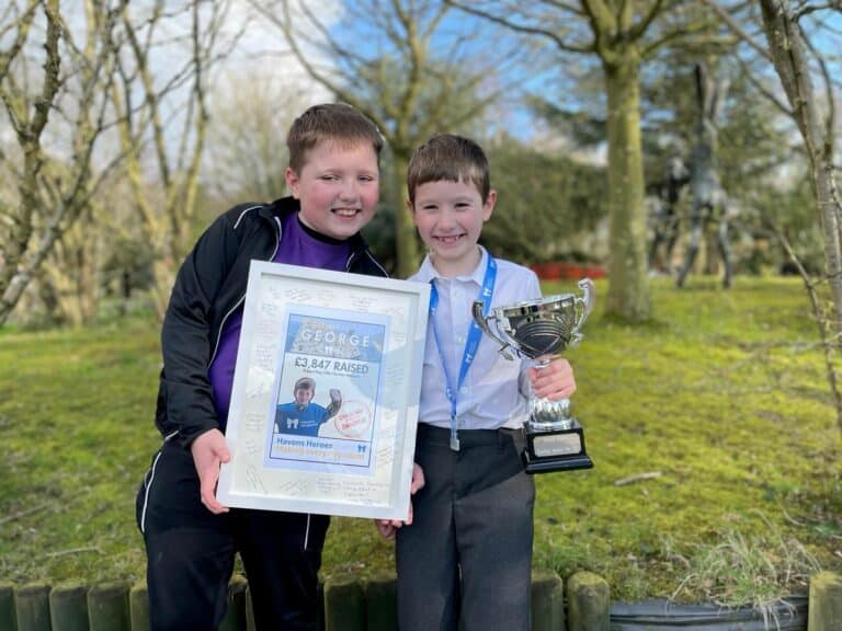 George and brother Oliver at Little Havens celebrating Georges fundraising.