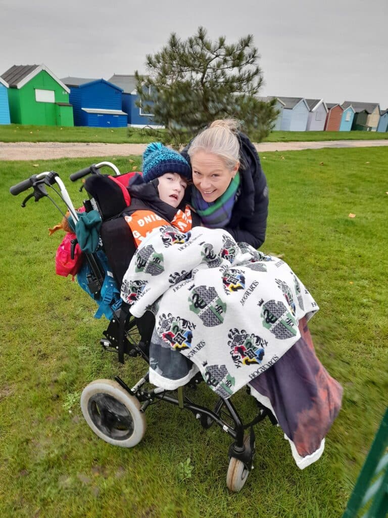 Oscar at the beach with his mum