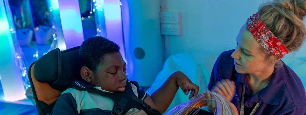 Ruel playing the sensory room at Little Havens