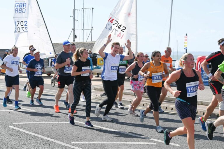 people running the Southend Half marathon smiling