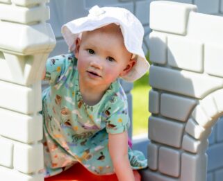Robyn playing in Little Havens garden