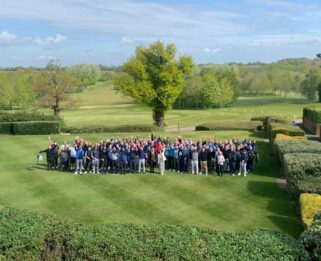 A group photo on the golf course at the Corporate Golf Day