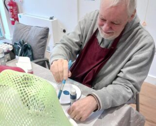 Brian painting his mask
