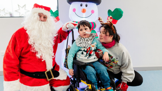 Archie and his sister meeting santa