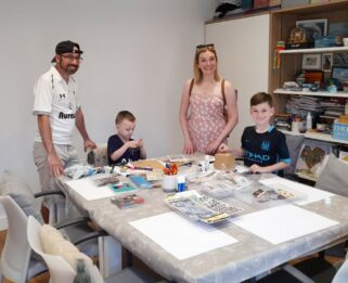 Nicola and family taking part in creative activities.