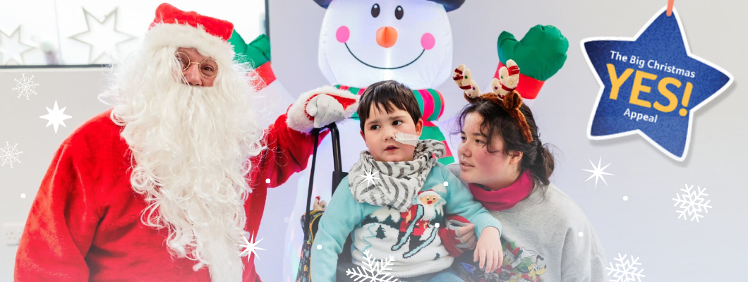 Archie and his sister meeting Santa