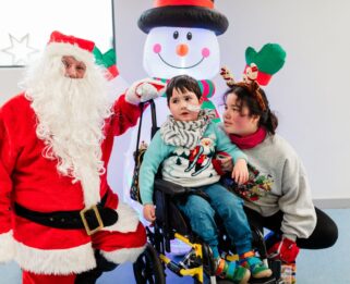 Archie with Santa at the Little Havens Christmas party