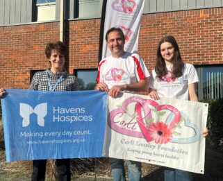 Judy Grocott, Head of Fundraising at Havens Hospices and Karl Lansley and his daughter