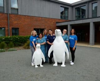 Nursing Team and Fundraisers with penguins