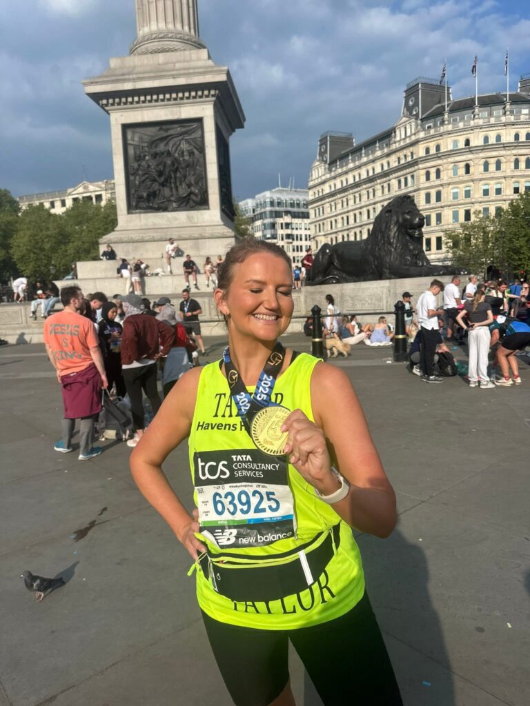 Taylor with her medal after the London marathon
