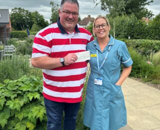 Bounds Green Lodge with member of care team.