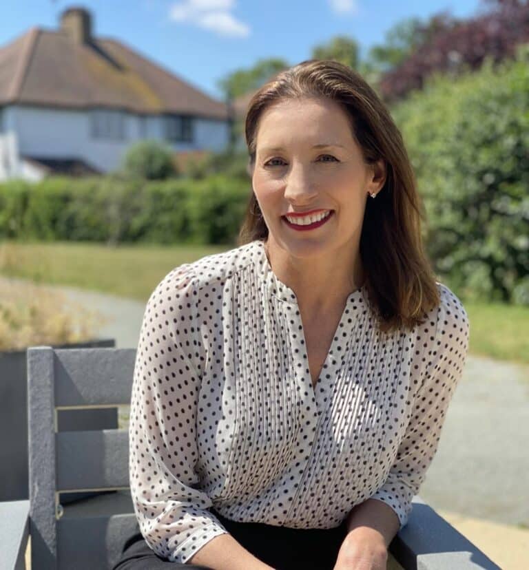 Photo of Louise Bryan in Fair Havens garden.