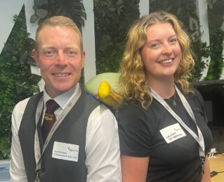 Scott and Lauren from Stibbards and Sons Ltd with penguin Poppy