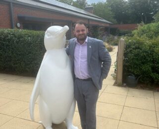 Cllr Matt Dent with blank penguin ahead of the trail.