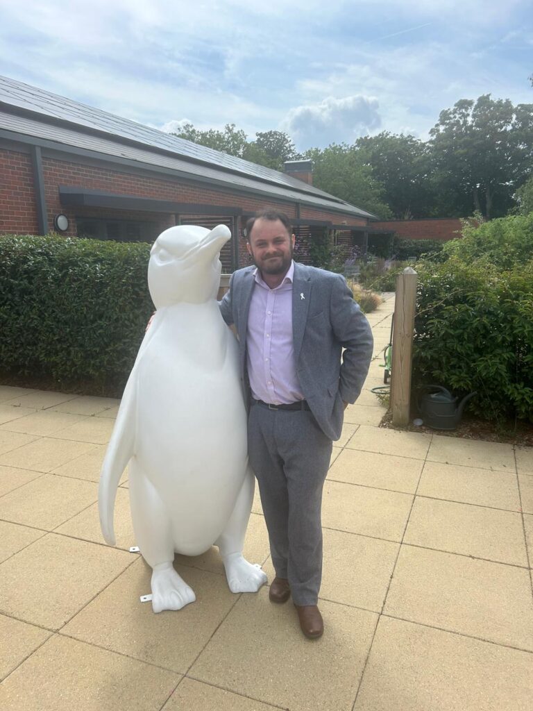 Cllr Matt Dent with blank penguin ahead of the trail.