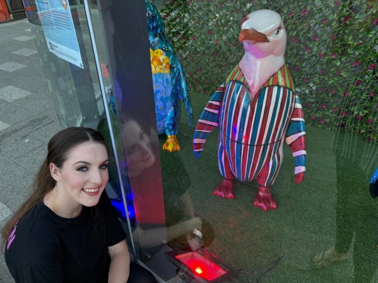 Niamh Connolly Joyce with her penguin David Bowie themed baby penguin sculpture.