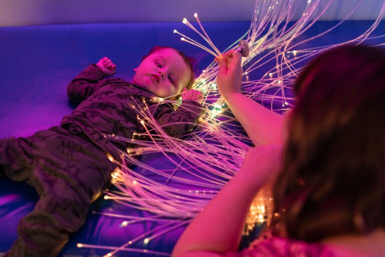 Mason in the sensory room at Little Havens.