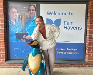 Raffle winner Tanya with Daisy outside Fair Havens.